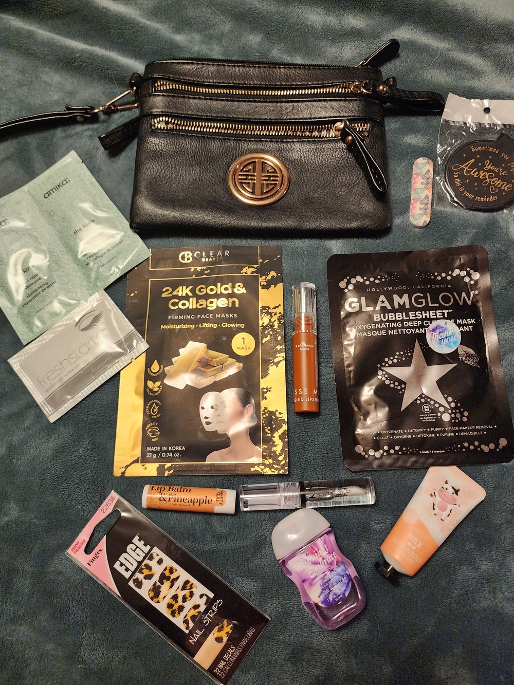 Black Vegan Leather Wristlet with Gold Emblem Filled With Beauty Bundle